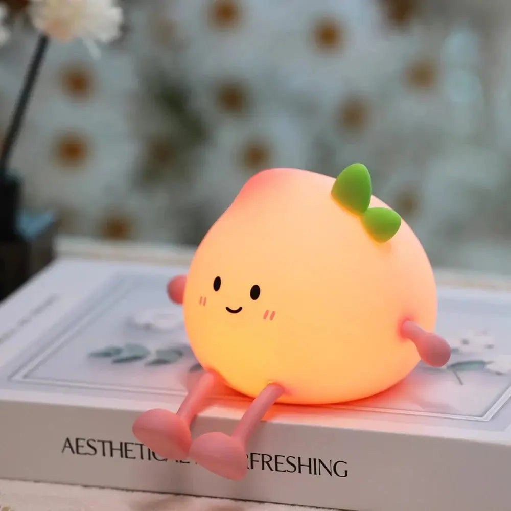 Veilleuse Portable en Forme de Pêche - Éclairage Doux et Mobile