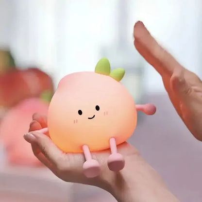 Veilleuse Portable en Forme de Pêche - Éclairage Doux et Mobile